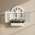 White decorative screen with floral arrangement in a room setting