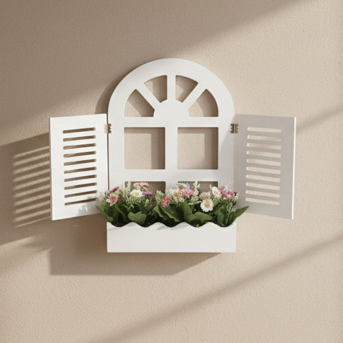 White decorative screen with floral arrangement in a room setting